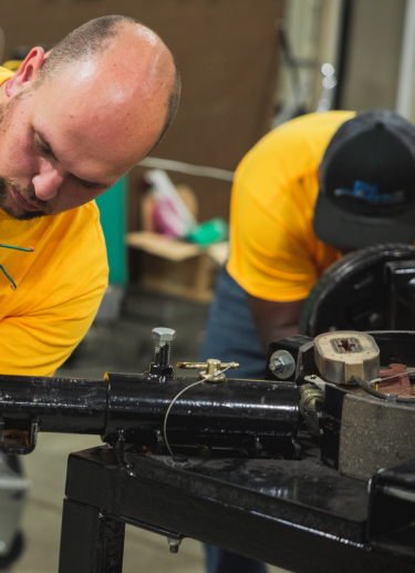 Man working on axel 