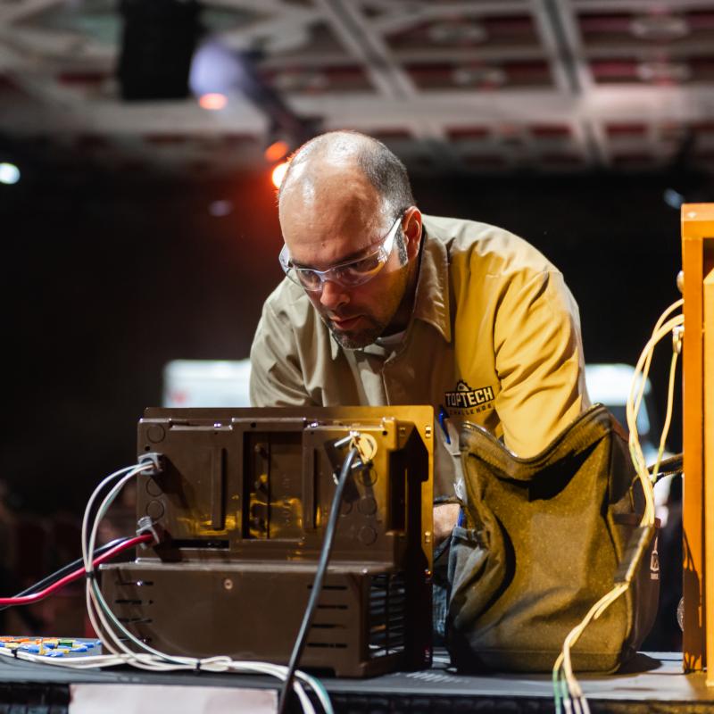 Technician working on box