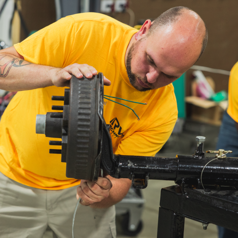 Man working on axel